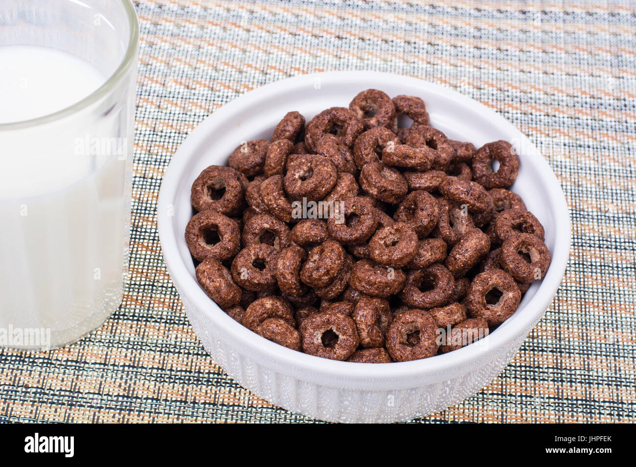 Chocolate ringlets with milk for breakfast. Studio Photo Stock Photo