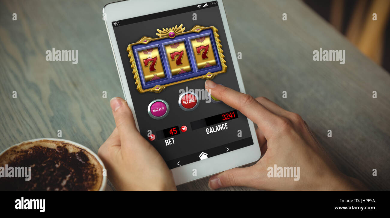 Casino Slot Machine App On Mobile Screen Against Cropped Hand Of Stock Photo Alamy