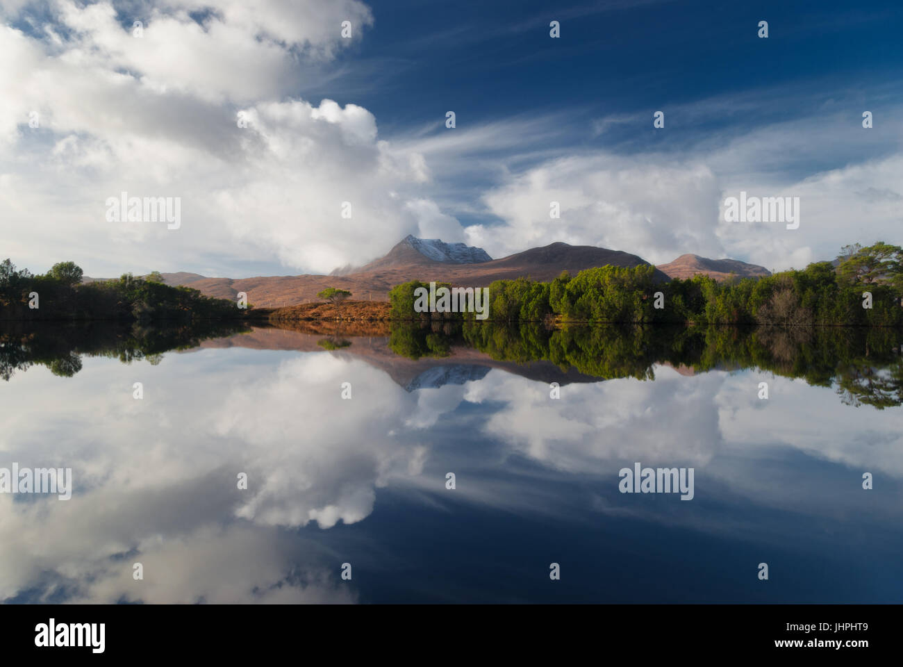 Ben More Coigach reflected Loch Cùl Dromannan in Assynt in the North ...