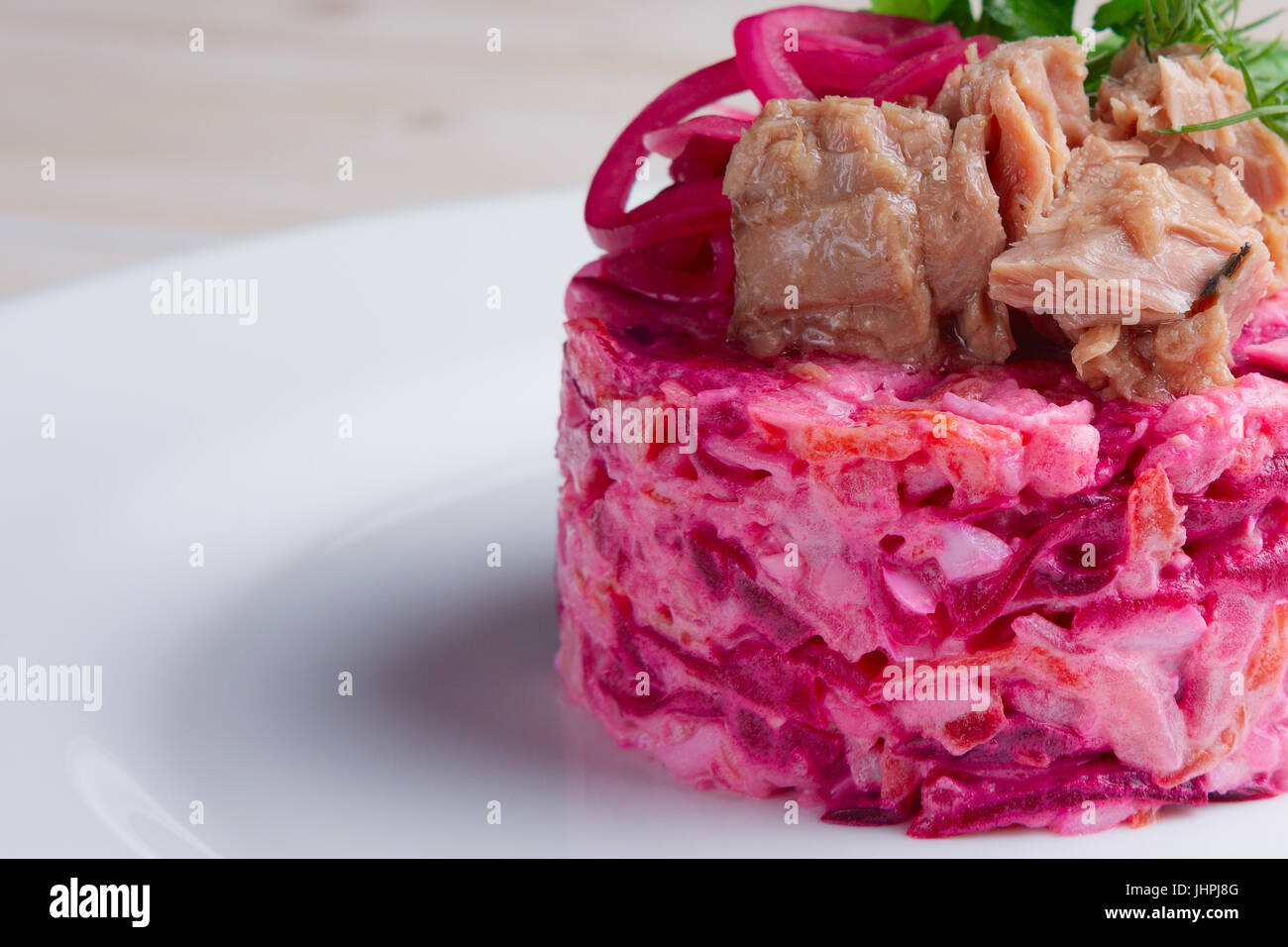 Closeup photo of salad with tuna, beetroot and carrot Stock Photo