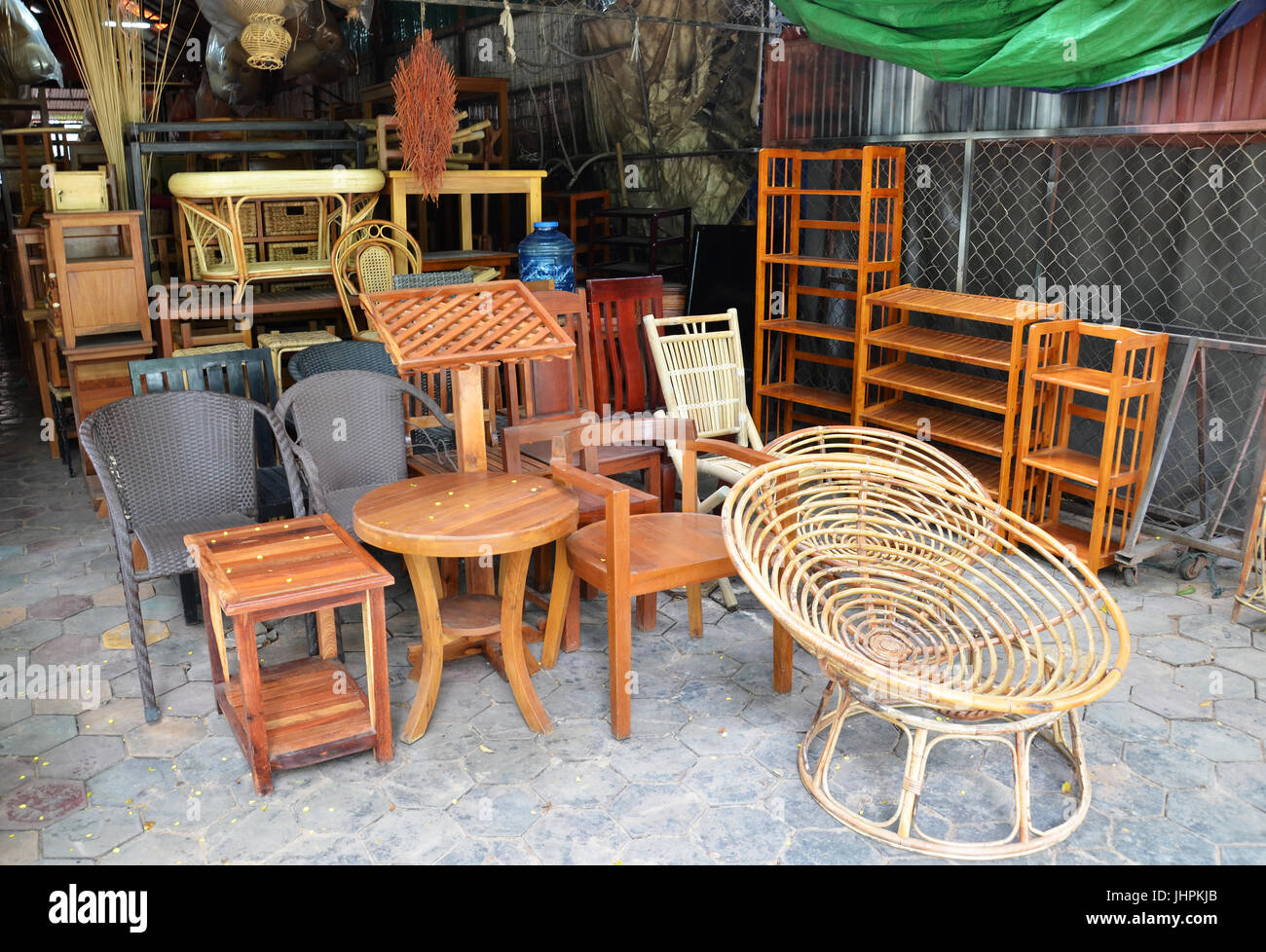 Wooden furniture outside their furniture business in Siem Reap