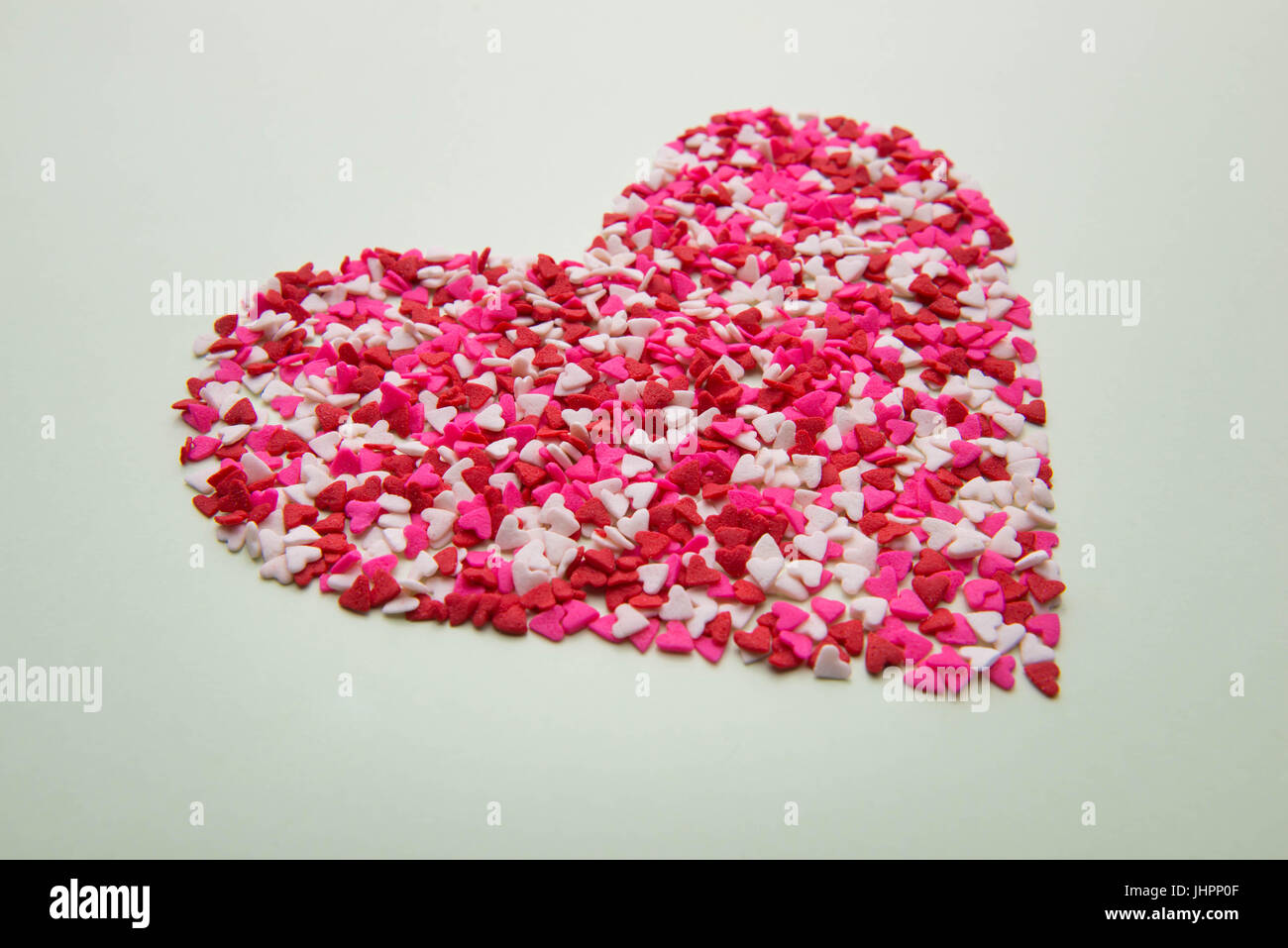 Valentines Day heart with lots of sweet candy hearts Stock Photo