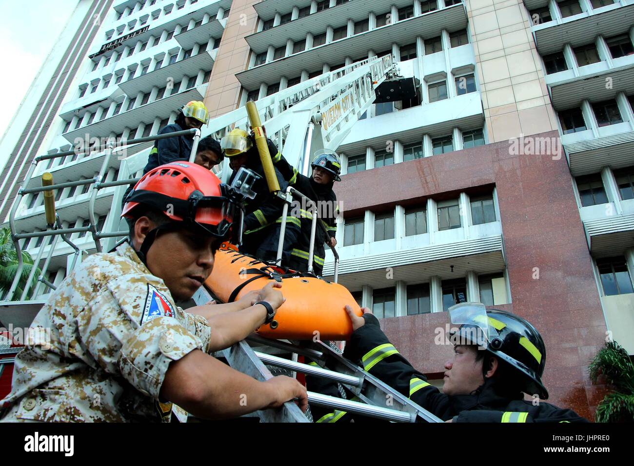 Fire Rescue Manila A fire rescue team carried the victim that was rescue at Quezon City ...
