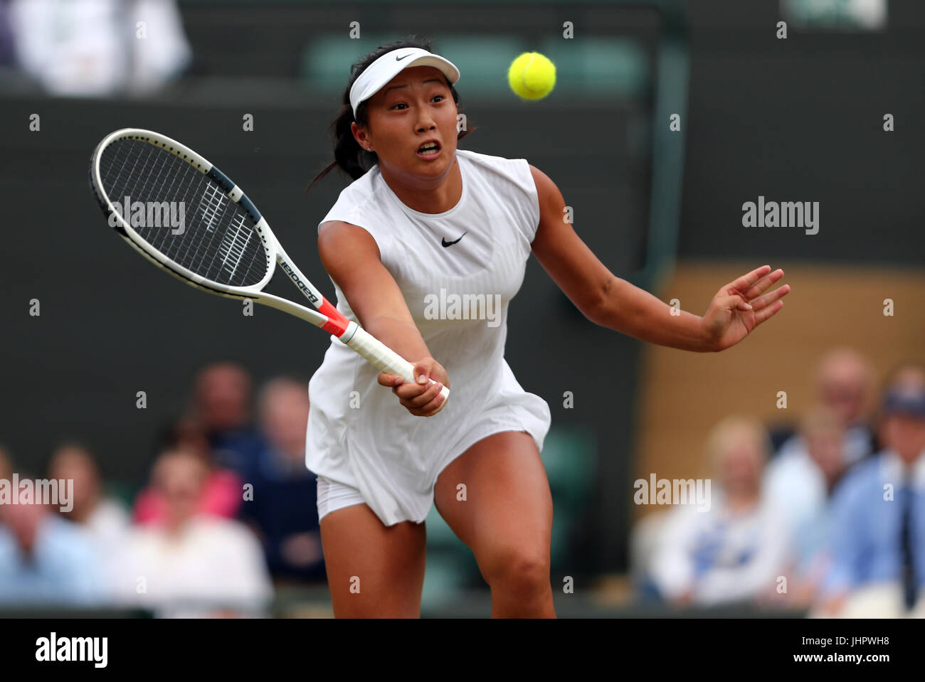 Claire Liu in action against Ann Li during the girls singles final on day  twelve of the Wimbledon Championships at The All England Lawn Tennis and  Croquet Club, Wimbledon Stock Photo -