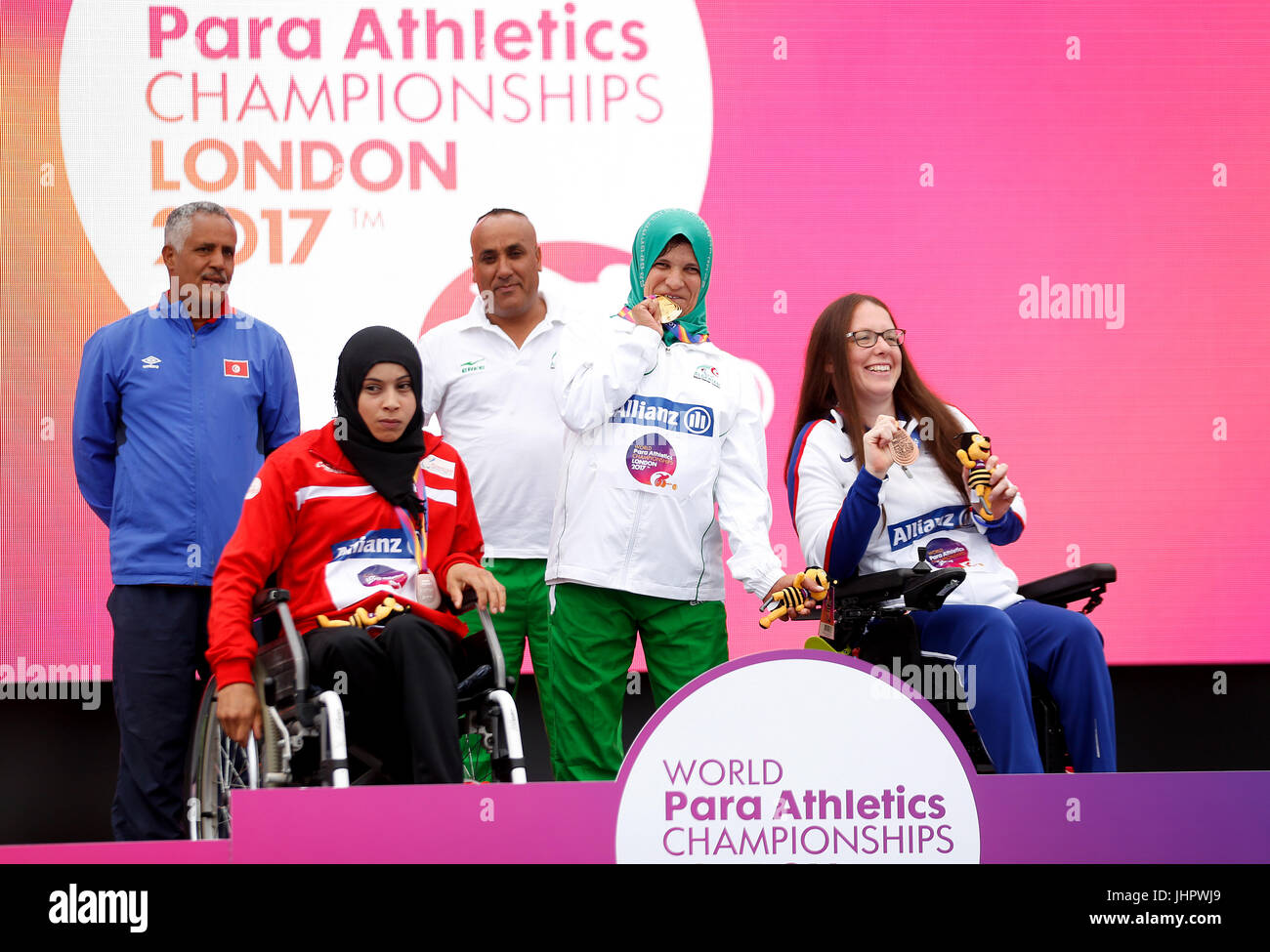 Algeria's Mounia Gasmi (centre) with her gold medal, Tunisia's Maroua Ibrahimi (left) with her silver medal and Great Britain's Gemma Prescott (right) with her bronze medal after the Women's Club Throw F32 during day two of the 2017 World Para Athletics Championships at London Stadium. Stock Photo