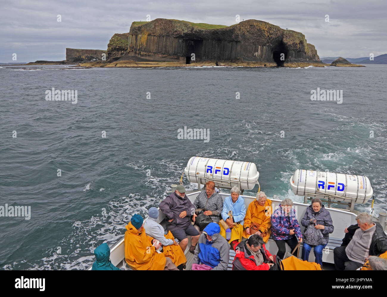 Tourists on sightseeing boat trip to Staffa, Scotland Stock Photo