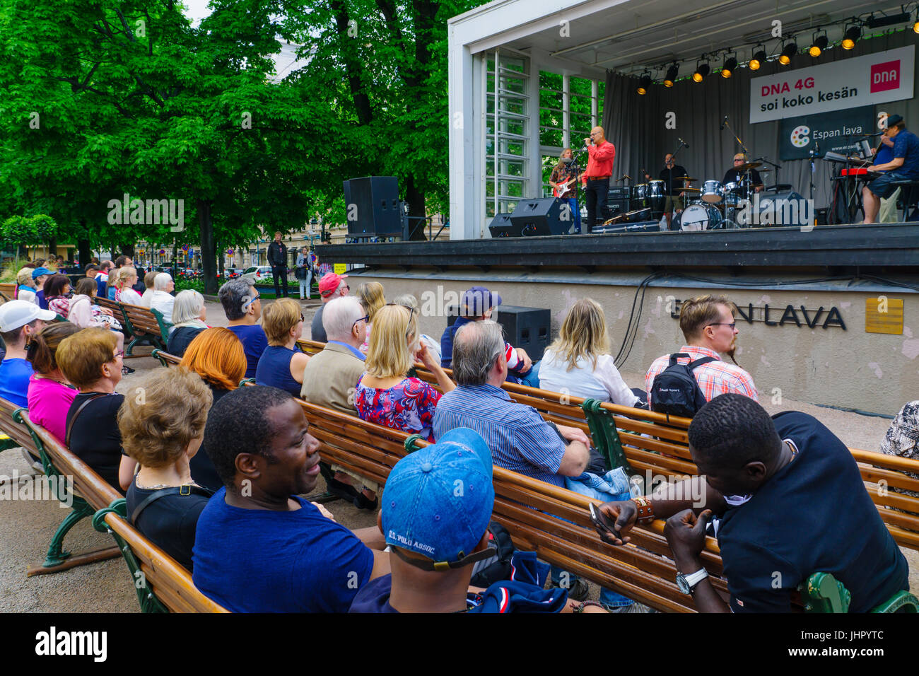 HELSINKI, FINLAND - JUNE 16, 2017: Scene of the Esplanade Park with musicians and audience, other locals and visitors, in Helsinki, Finland Stock Photo