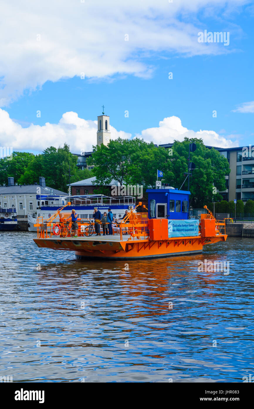 TURKU, FINLAND - JUNE 23, 2017: Scene of the Aura river, with the Fori ferry and passengers, in Turku, Finland Stock Photo
