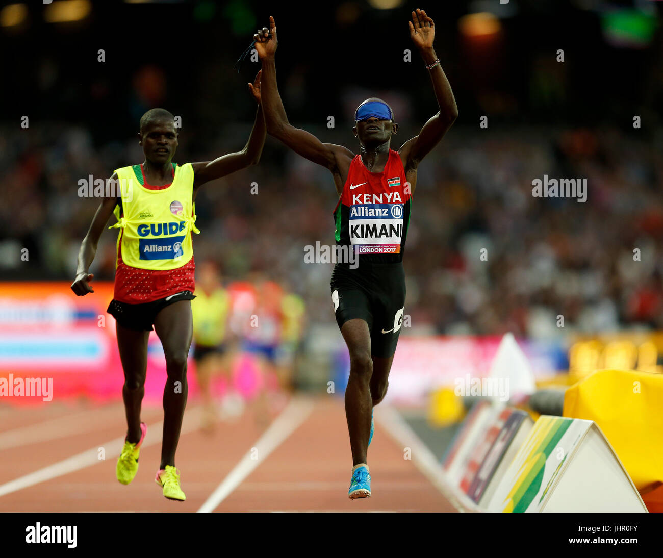 Kenya's Samwel Mushai Kimani and guide James Boit winning the Men's