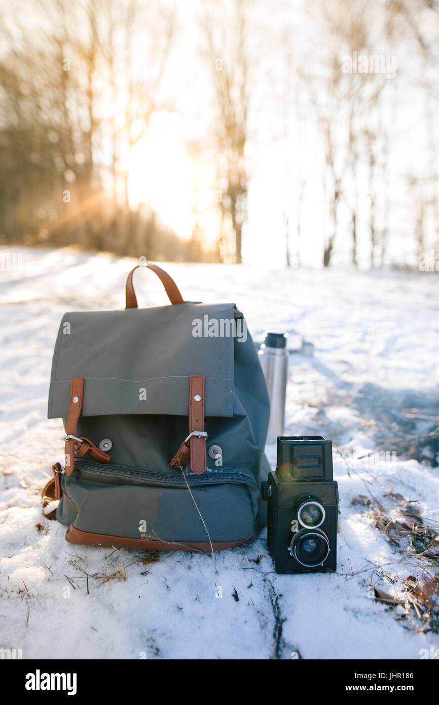 Hiking backpack and camera. Hike concept of trekking hike gear