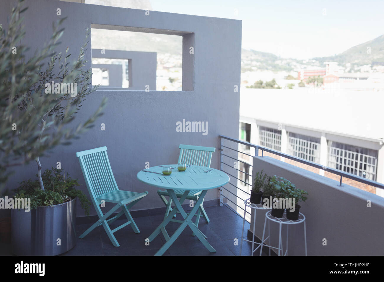Empty table and chair in gallery at home Stock Photo - Alamy