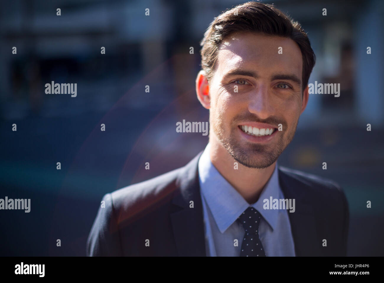 Modern businessman smiling camera close hi-res stock photography and ...