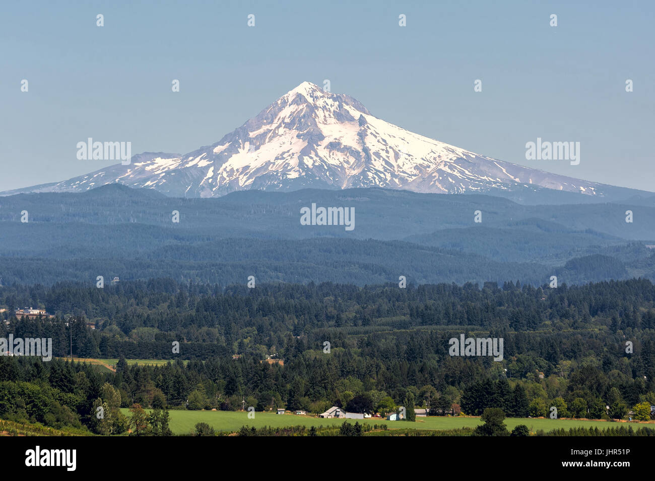 Mount Hood in Clackamas County Oregon during a blue sky summer day Stock Photo