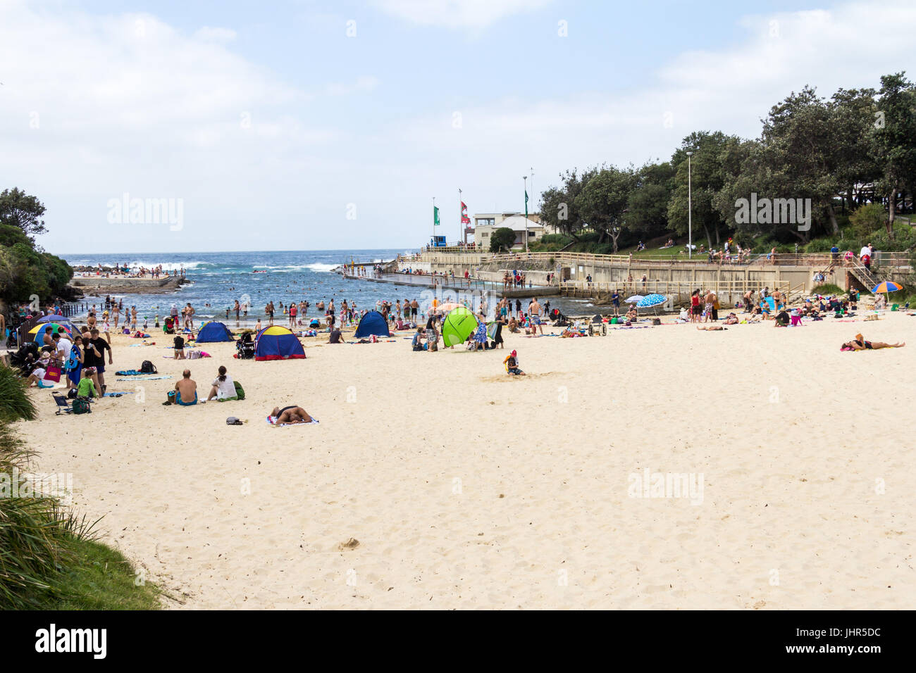 people enjoying the sunshine on Clovelly Beach, Sydney, New South Wales, Australia Stock Photo