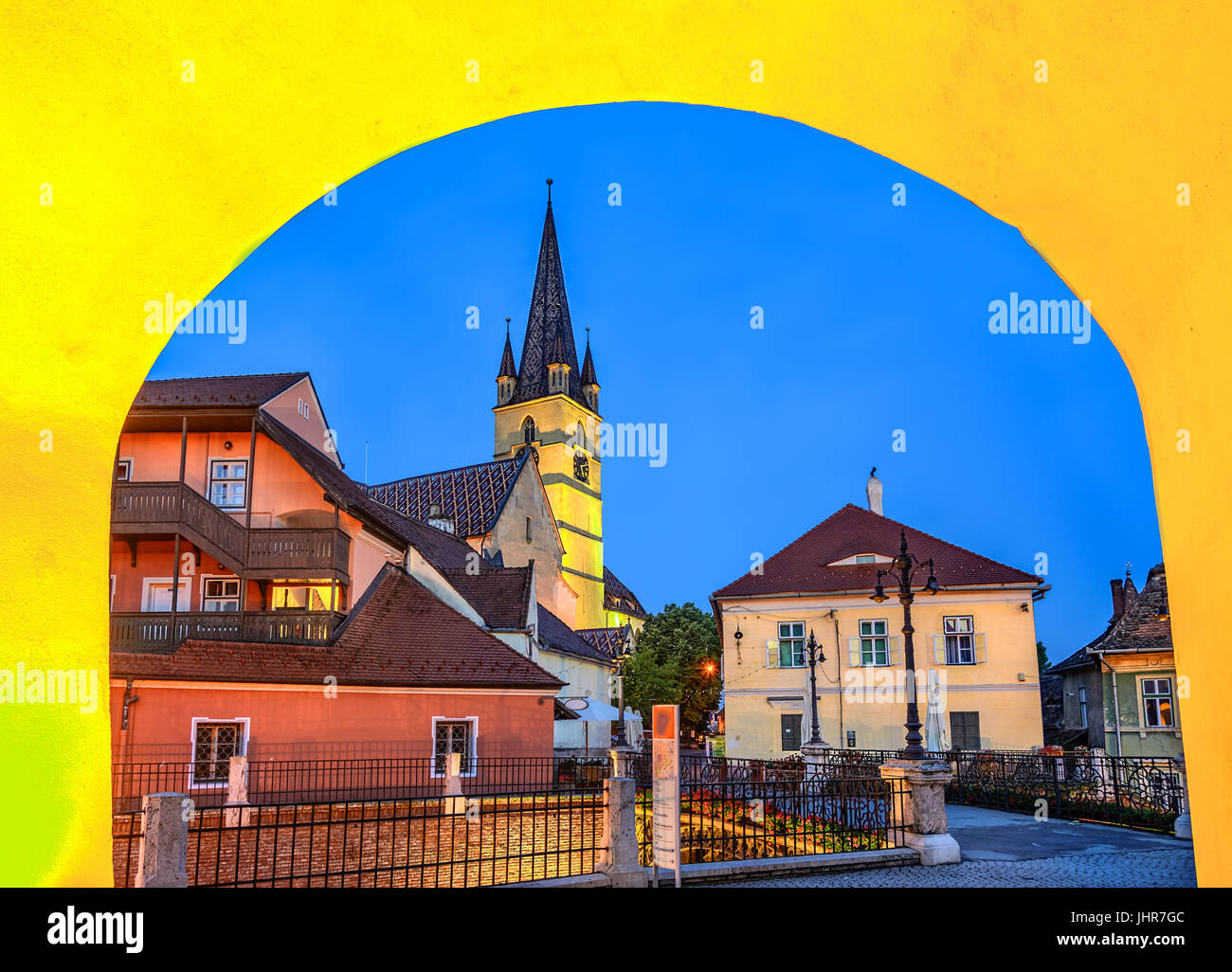 Lutheran Cathedral and the Liars Bridge seen from the Small Square of Sibiu, Transylvania,Sibiu, Romania. Stock Photo