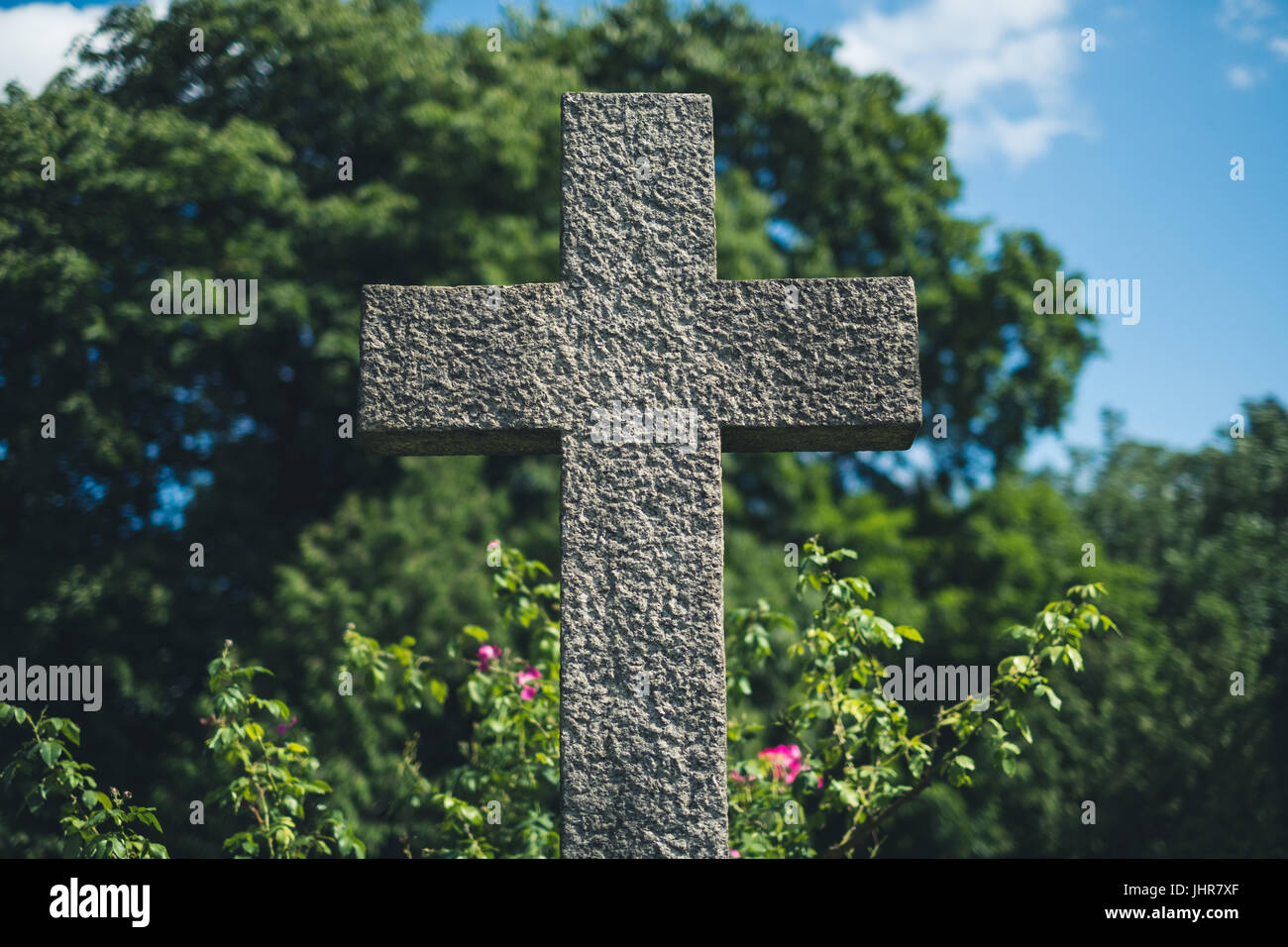 stone cross on grave gravestone on cemetery Stock Photo Alamy