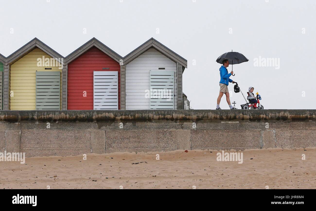 Rainy weather at the beach in Blyth on the North East coast on St Swithin's Day as legend has it that if it rains on St Swithin's Day then the wet weather will continue for 40 days. Stock Photo