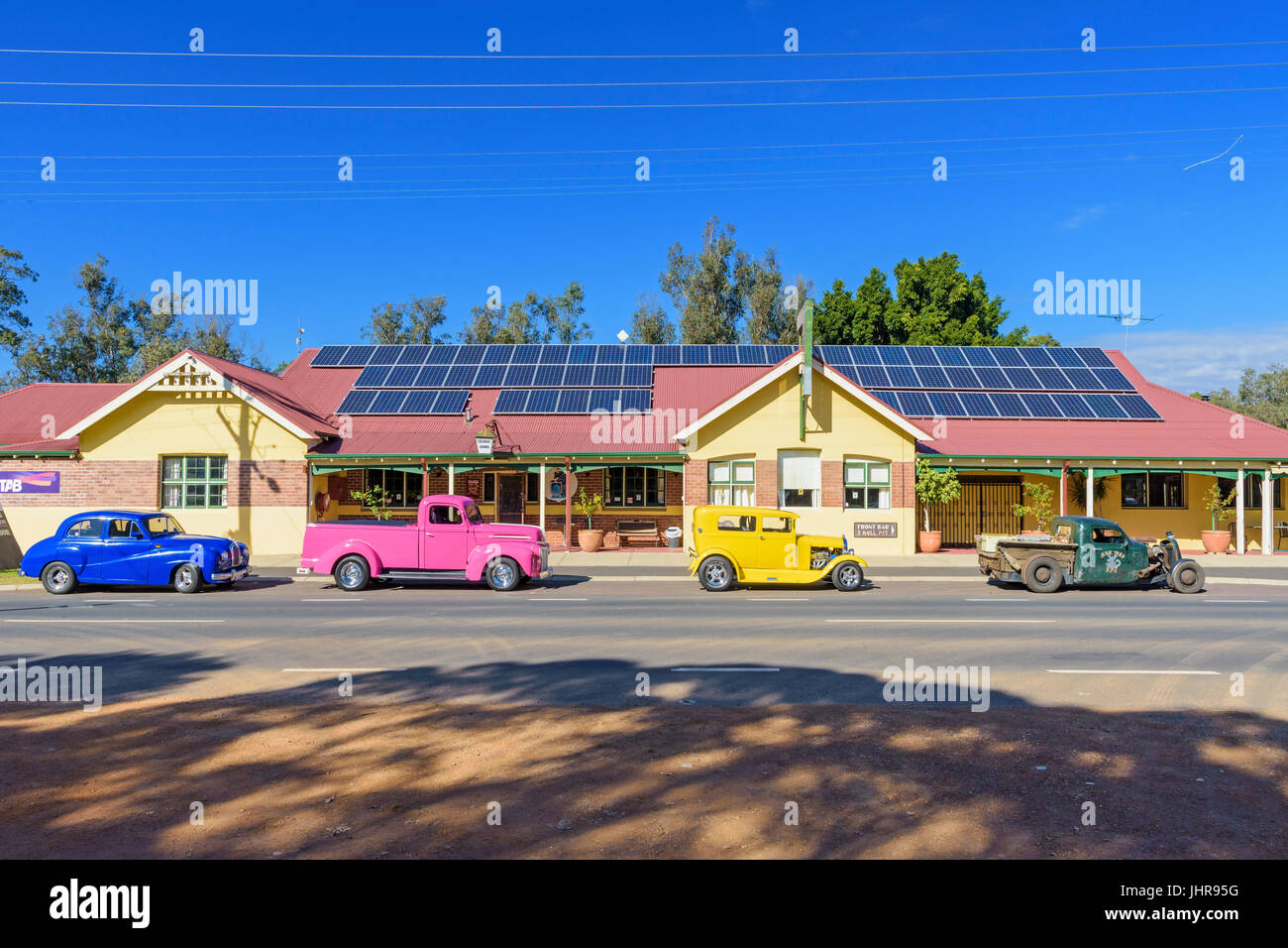 Hot Rod cars parked on the street outside the Bull and Bush Tavern, Boyanup, Western Australia Stock Photo