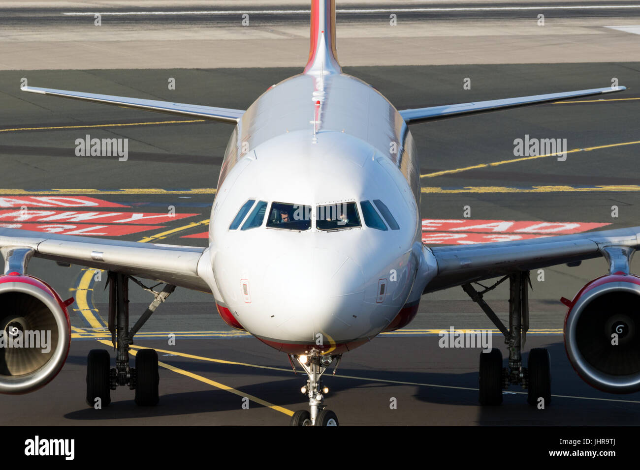 DUSSELDORF, GERMANY - DEC 16, 2016: Airbus A319 plane from Air Berlin airline taxiing to the gate at Dusseldorf airport. Stock Photo