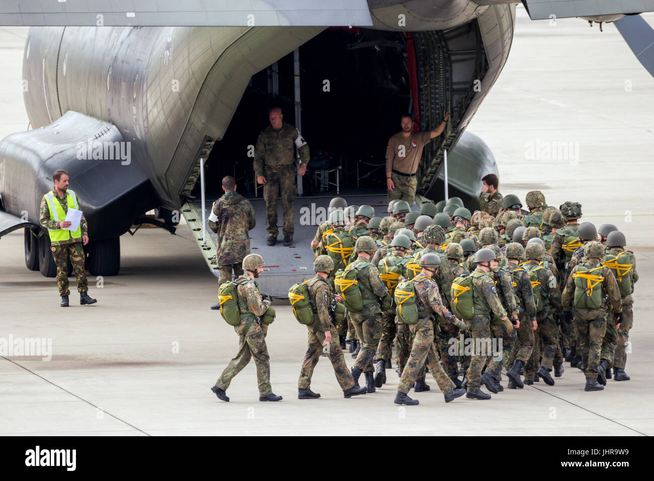 EINDHOVEN, THE NETHERLANDS - SEP 17, 2016: German paratroopers entering a C-160 Transall plane for a jump at the Market Garden Memorial. Stock Photo