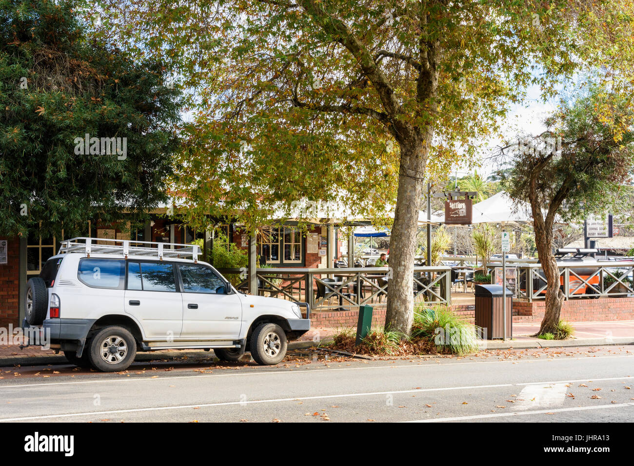 Four wheel drive parked outside the Settlers Tavern in the middle of Margaret River Town, Western Australia Stock Photo