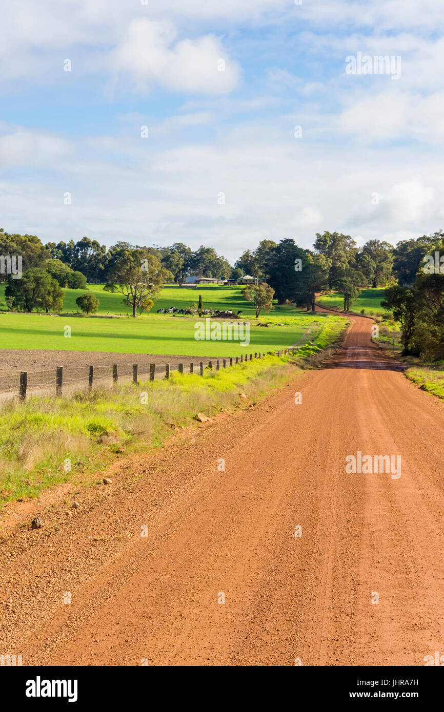 Gravel road in farming country near Cowaramup in the Margaret River Region of Western Australia Stock Photo