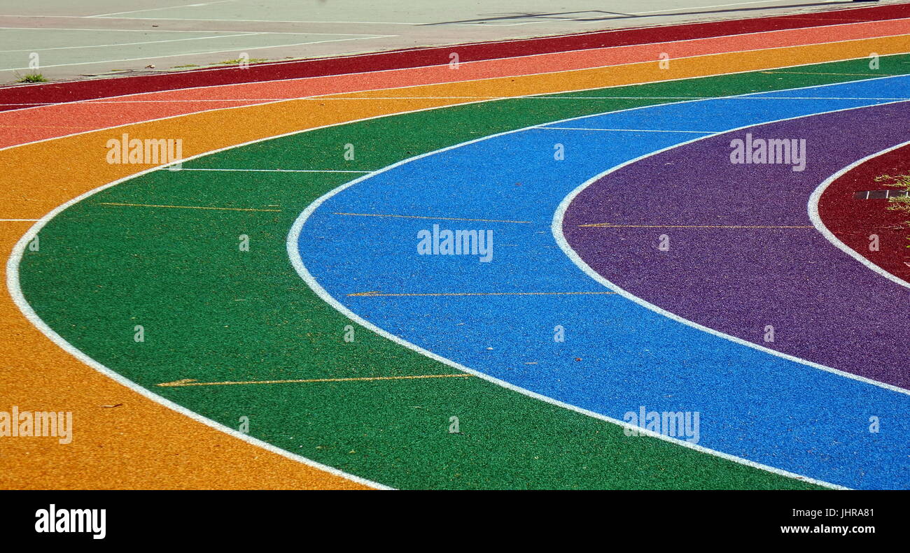 Running tracks in several bright colors with white lane markings Stock  Photo - Alamy
