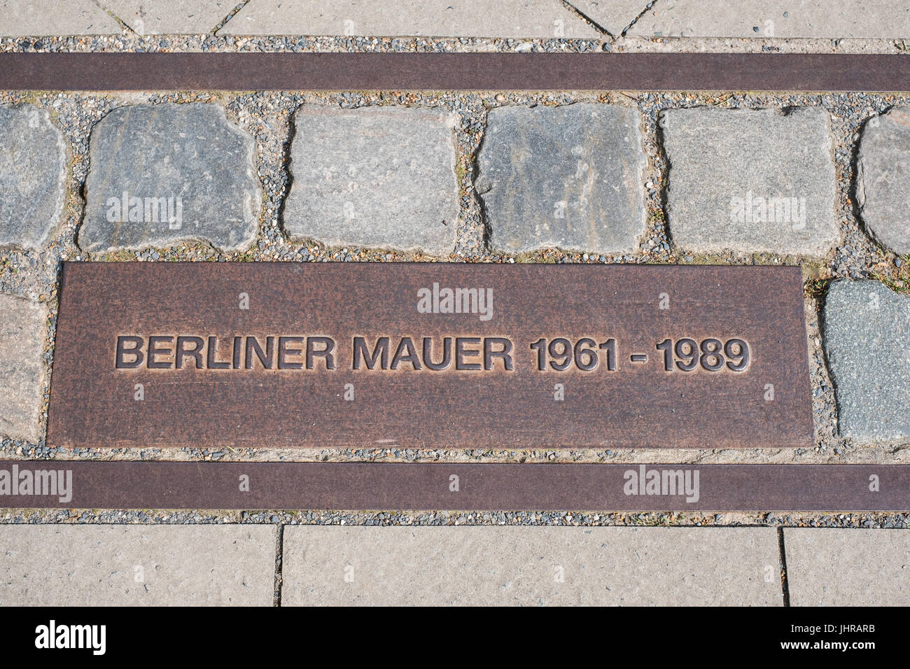 Berlin, Germany - July 13, 2017: Berliner Mauer ( Berlin Wall) / memorial on sidewalk   at Bernauer Strasse in Berlin, Germany. Stock Photo