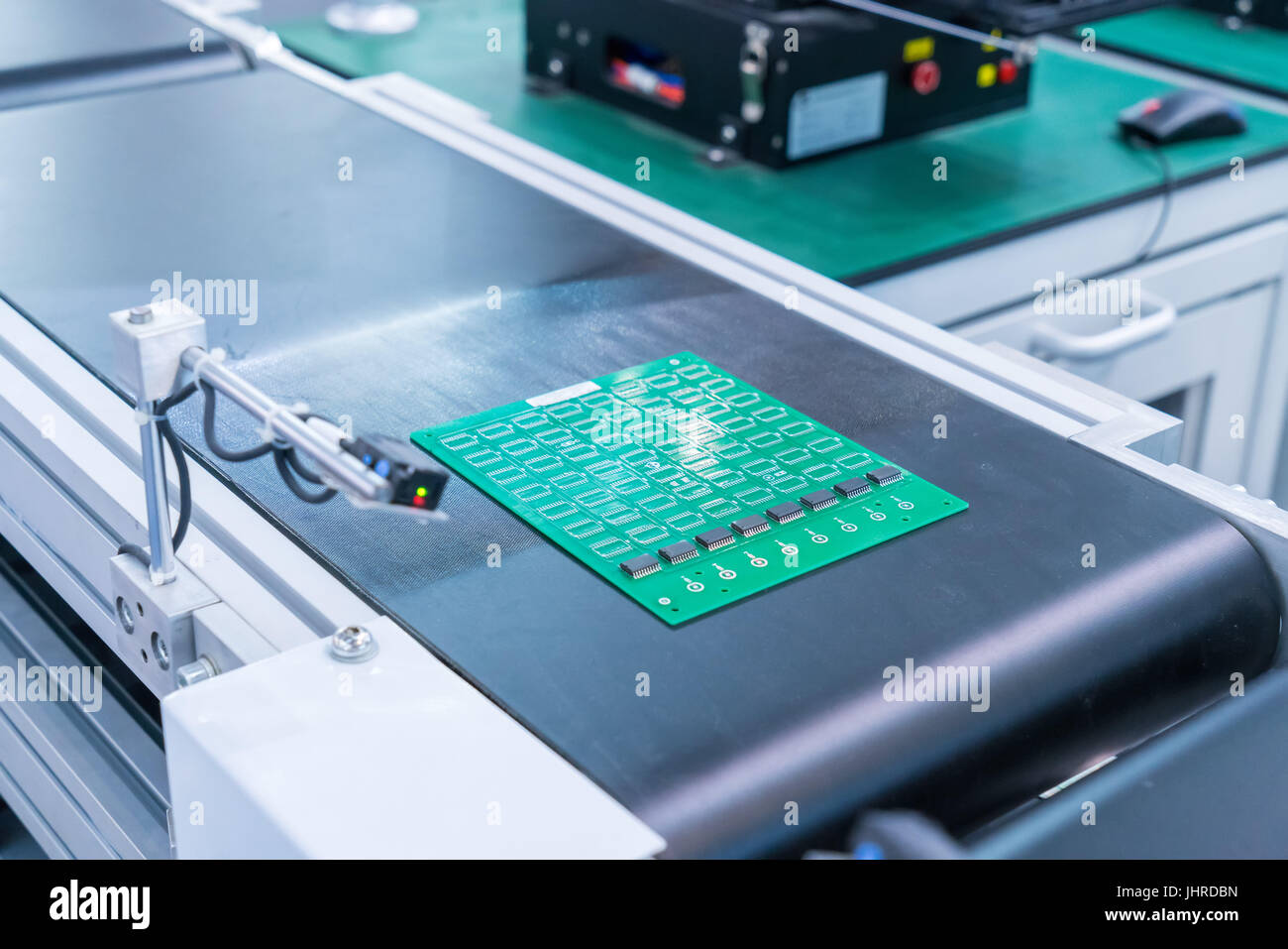 PCB Processing on CNC machine,Production of electronic components at high-tech factory Stock Photo