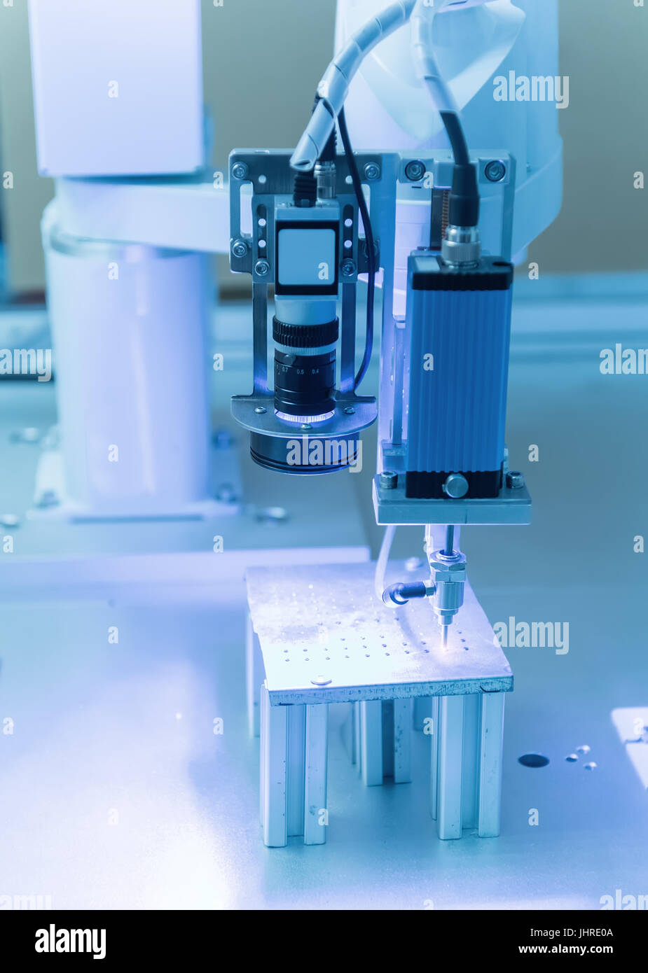 robot drill machine tool at industrial manufacture factory Stock Photo
