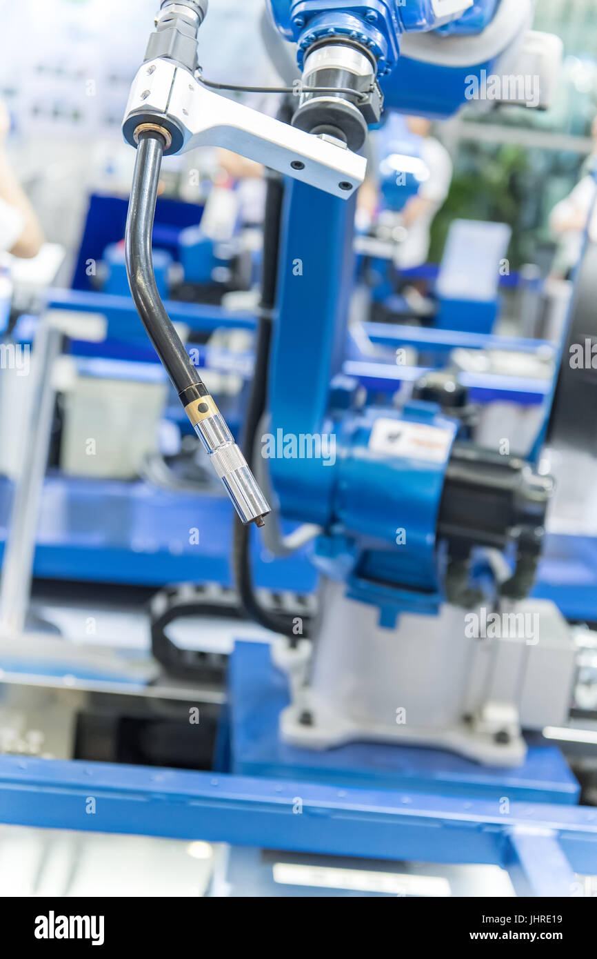 Industrial robotic arm for welding. Stock Photo