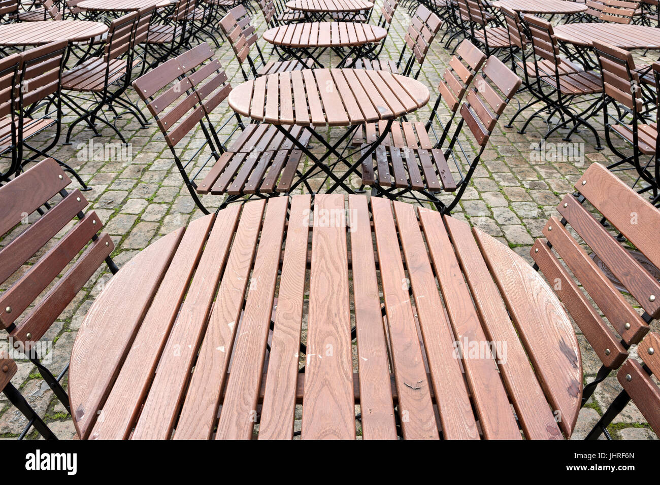 tables and chairs of a beer garden Stock Photo