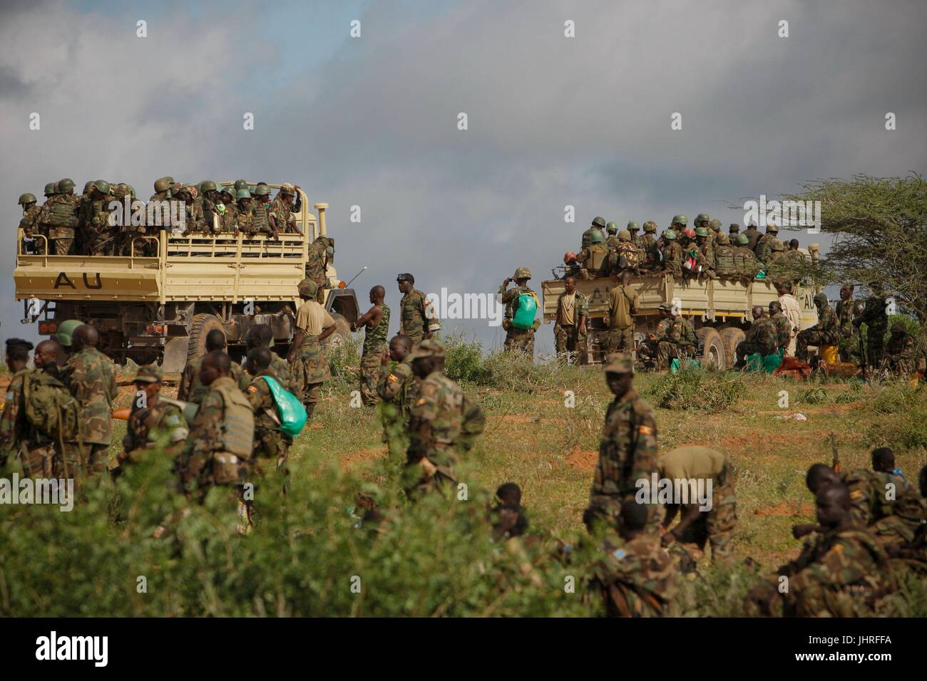 Ugandan soldiers board military trucks as they prepare to deploy to Merka to drive out the Al-Qaeda-affiliated extremist group Al Shabaab May 27, 2012 in Afgoye, Somalia.    (photo by Stuart Price  via Planetpix) Stock Photo