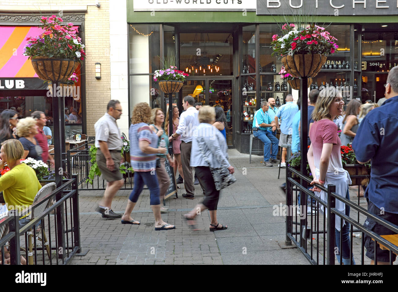 Pedestrian-only East 4th in downtown Cleveland, Ohio, is one of several entertainment districts in the area catering to visitors and residents. Stock Photo
