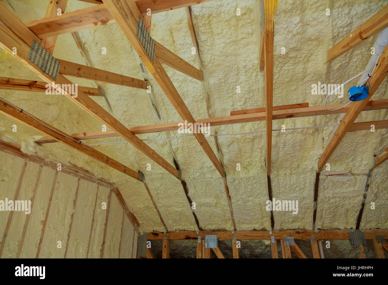 wall of an apartment building, covered with insulation foam before ...