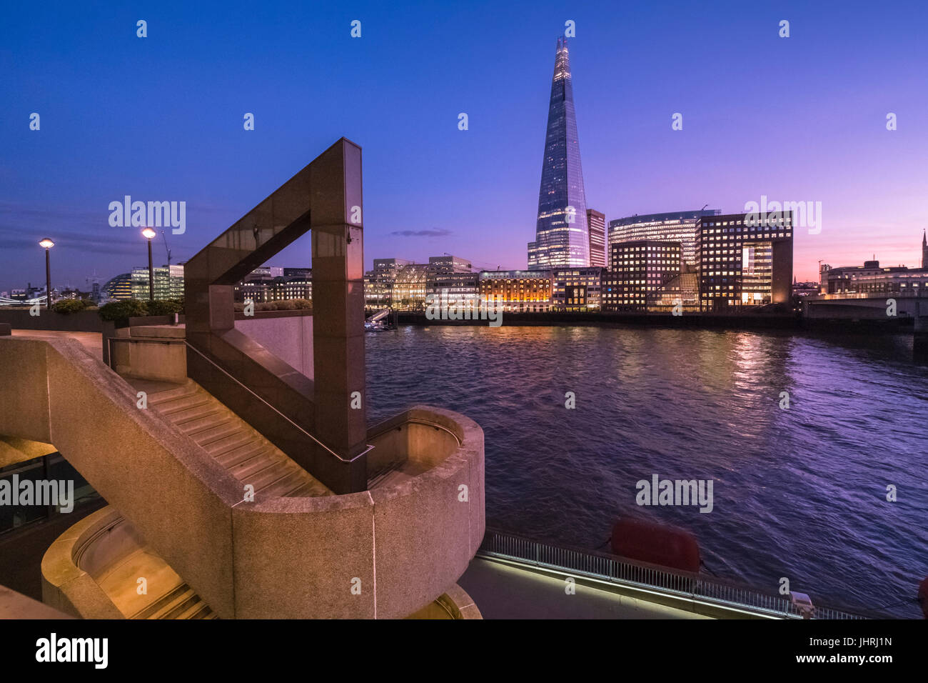London skyline at sunset, featuring The Shard and 1 London Bridge buildings. Stock Photo