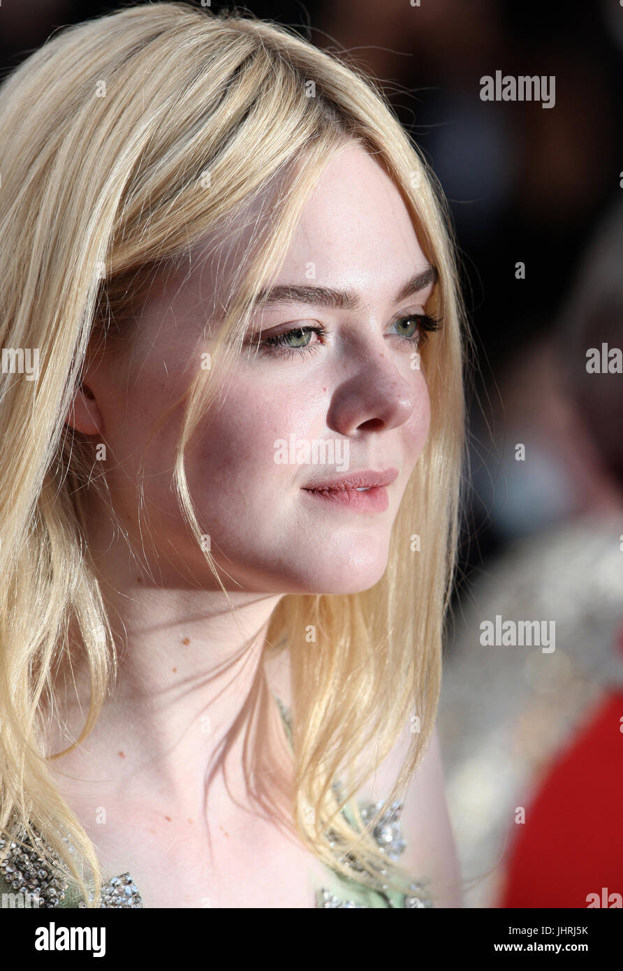 Actress Elle Fanning departs after the How To Talk To Girls At Parties screening during the 70th annual Cannes Film Festival at Palais des Festivals on May 21, 2017 in Cannes, France. Stock Photo