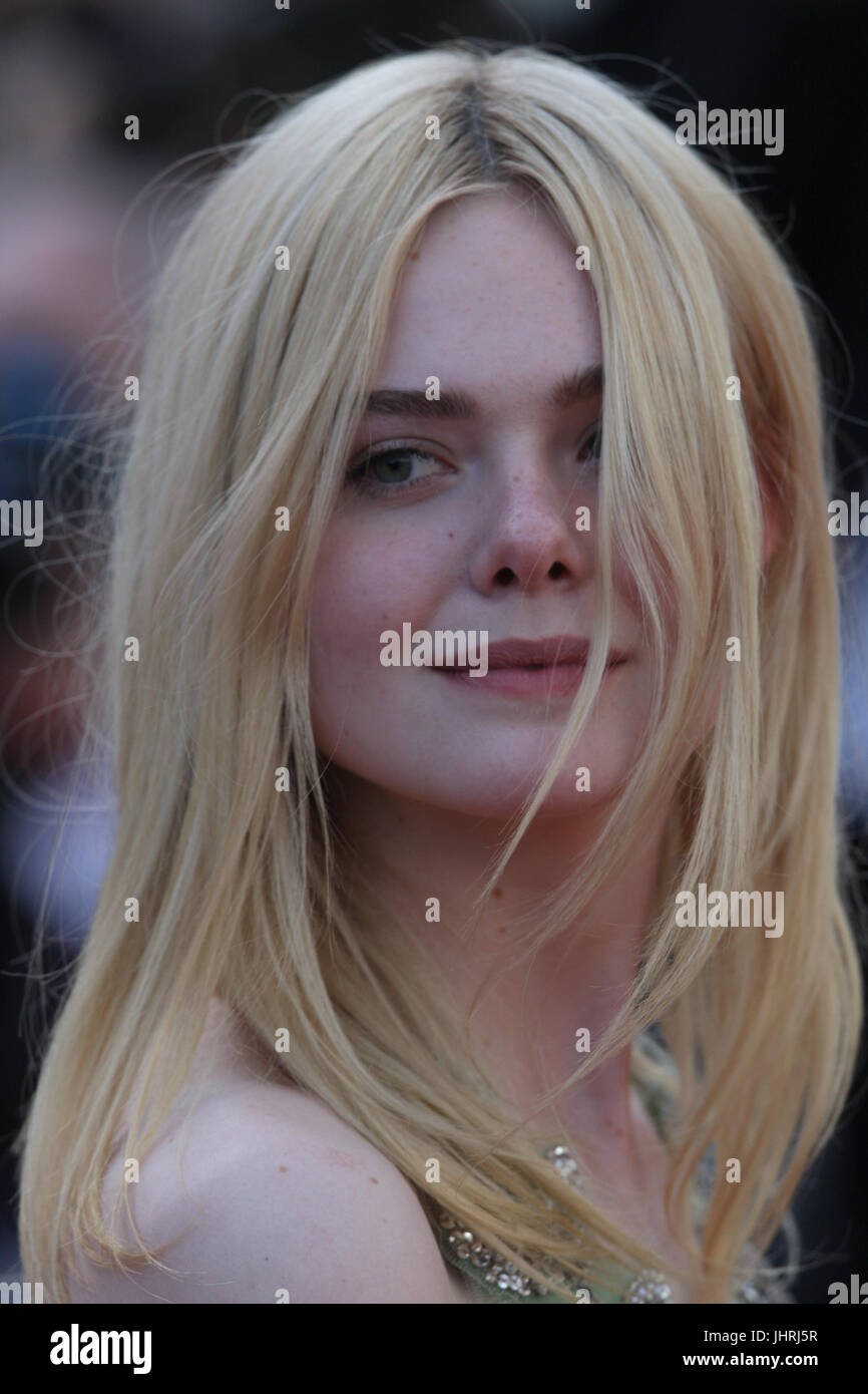 Actress Elle Fanning departs after the How To Talk To Girls At Parties screening during the 70th annual Cannes Film Festival at Palais des Festivals on May 21, 2017 in Cannes, France. Stock Photo