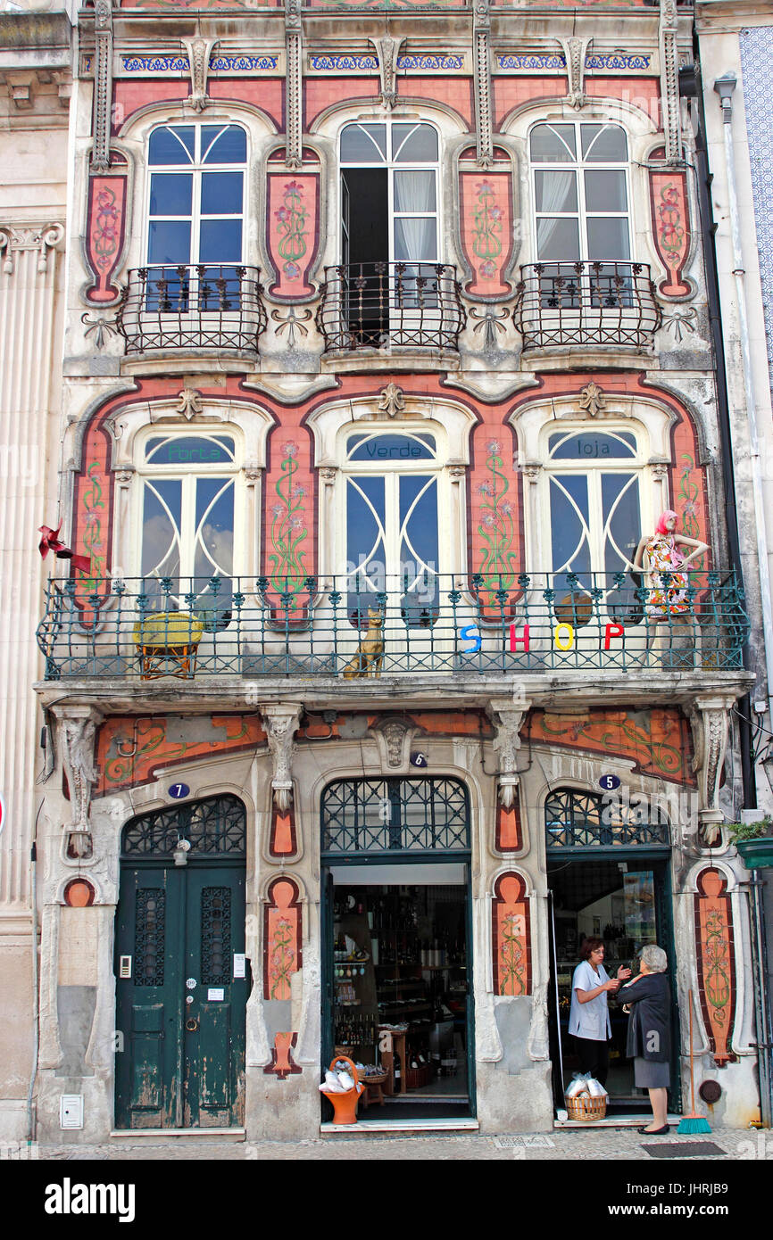 Art nouveau painted facade shop building along the Central Canal Aveiro Portugal Stock Photo