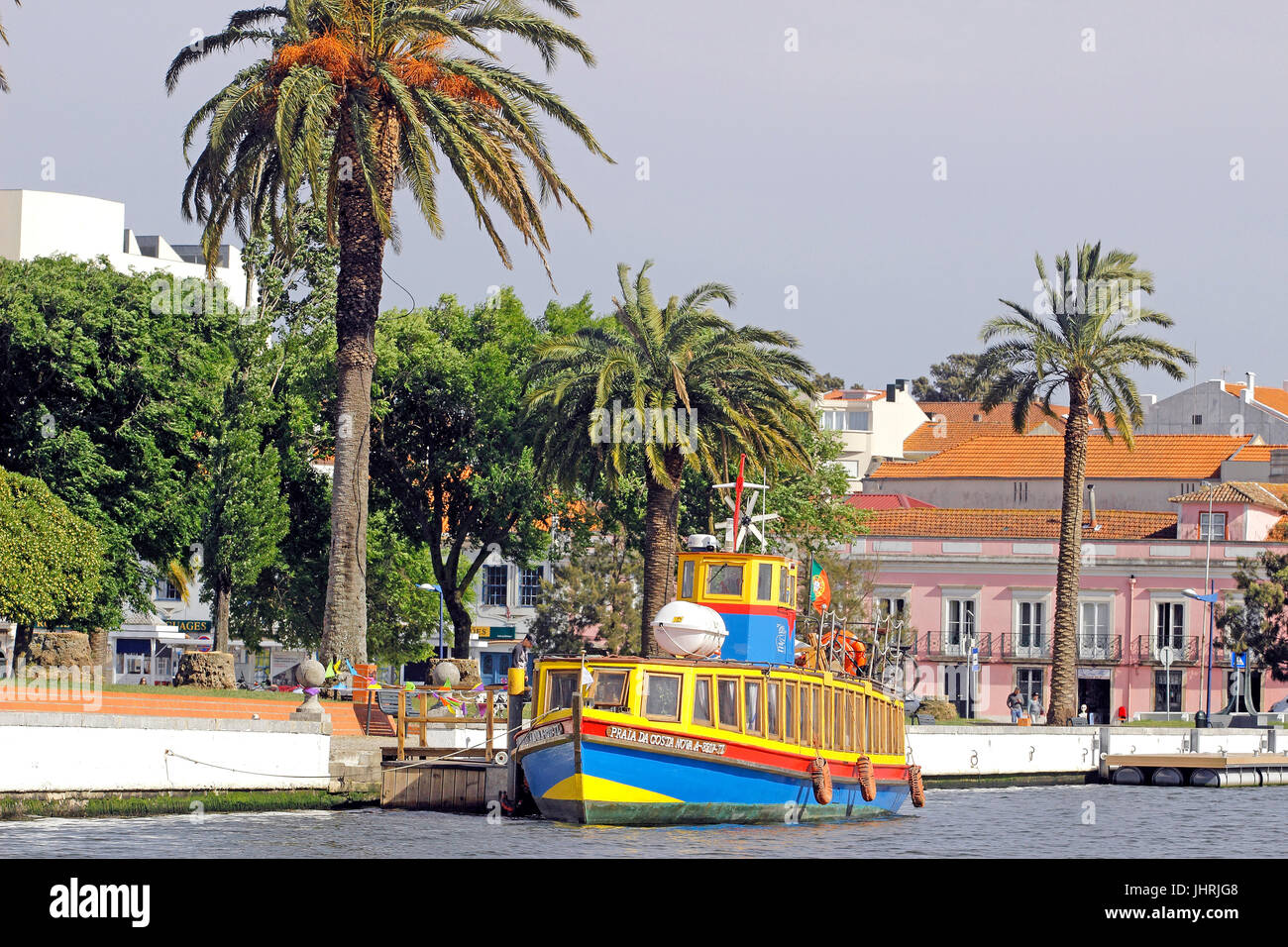 Decorative boats and art nouveau building facades along the Central Canal Aveiro Portugal Stock Photo