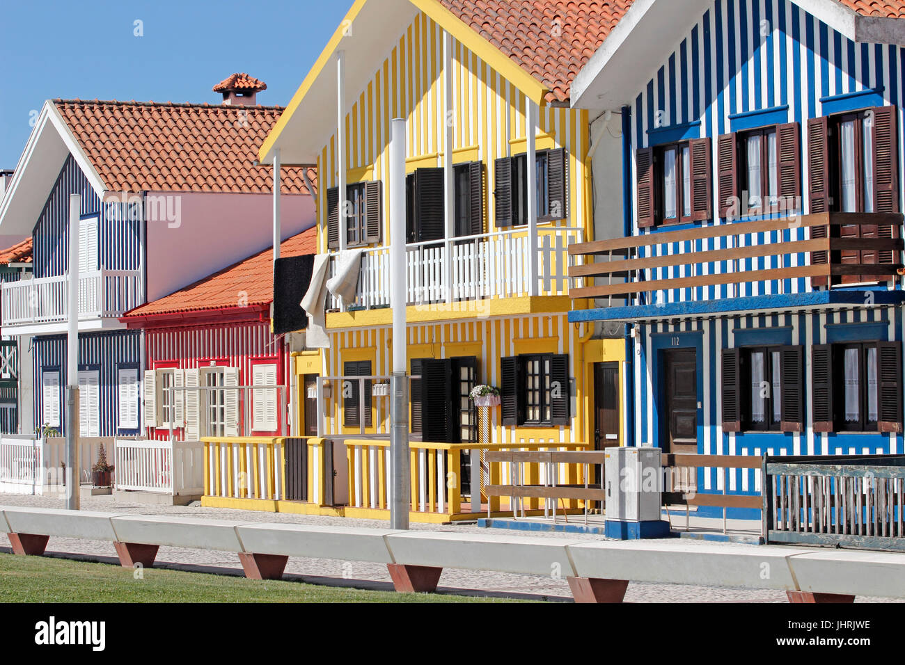 Colorful candy striped cottages in Costa Nova near Aveiro Portugal Stock Photo