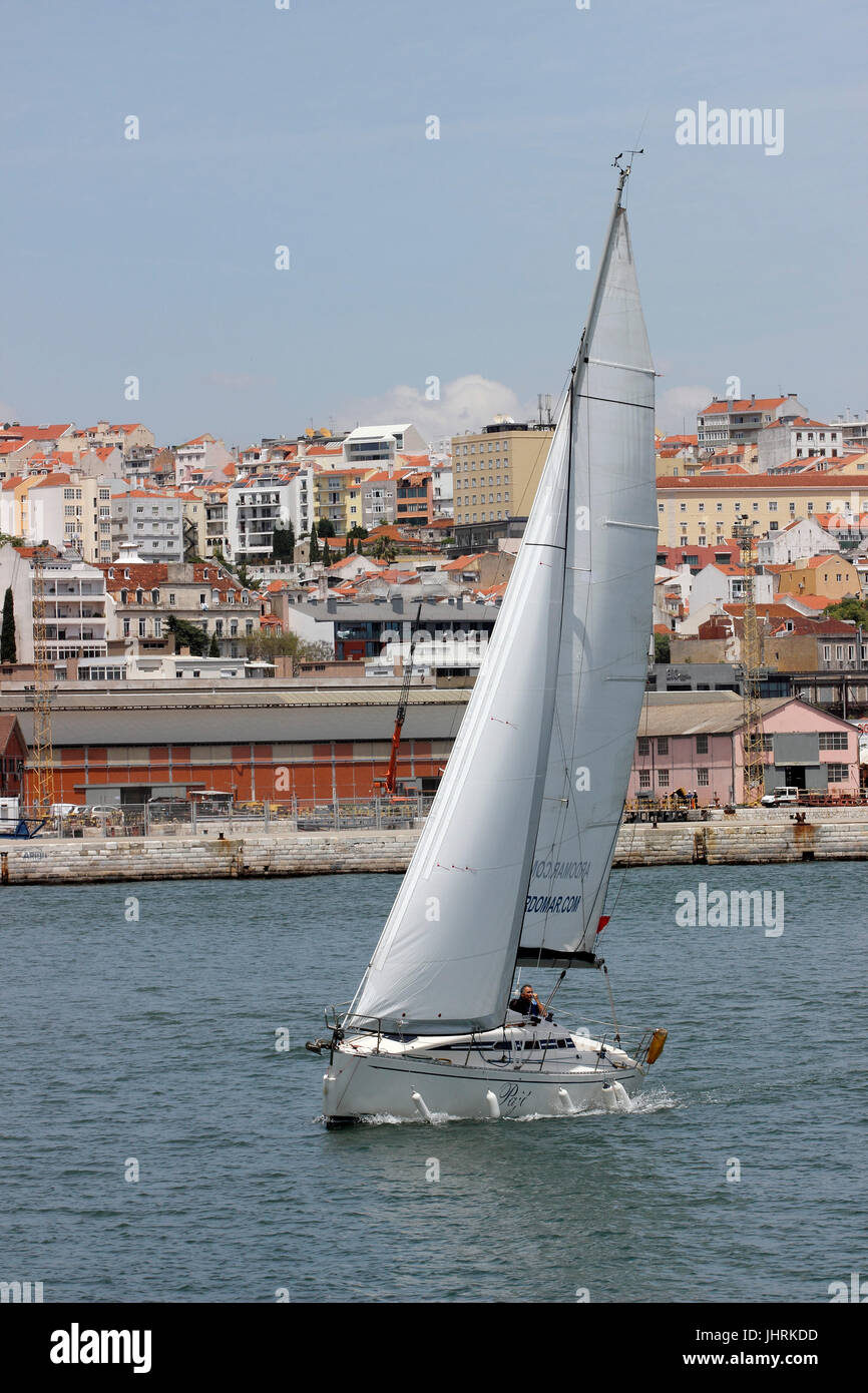 Sailing Port of Lisbon on the Tagus River with city neighborhood Lisbon ...