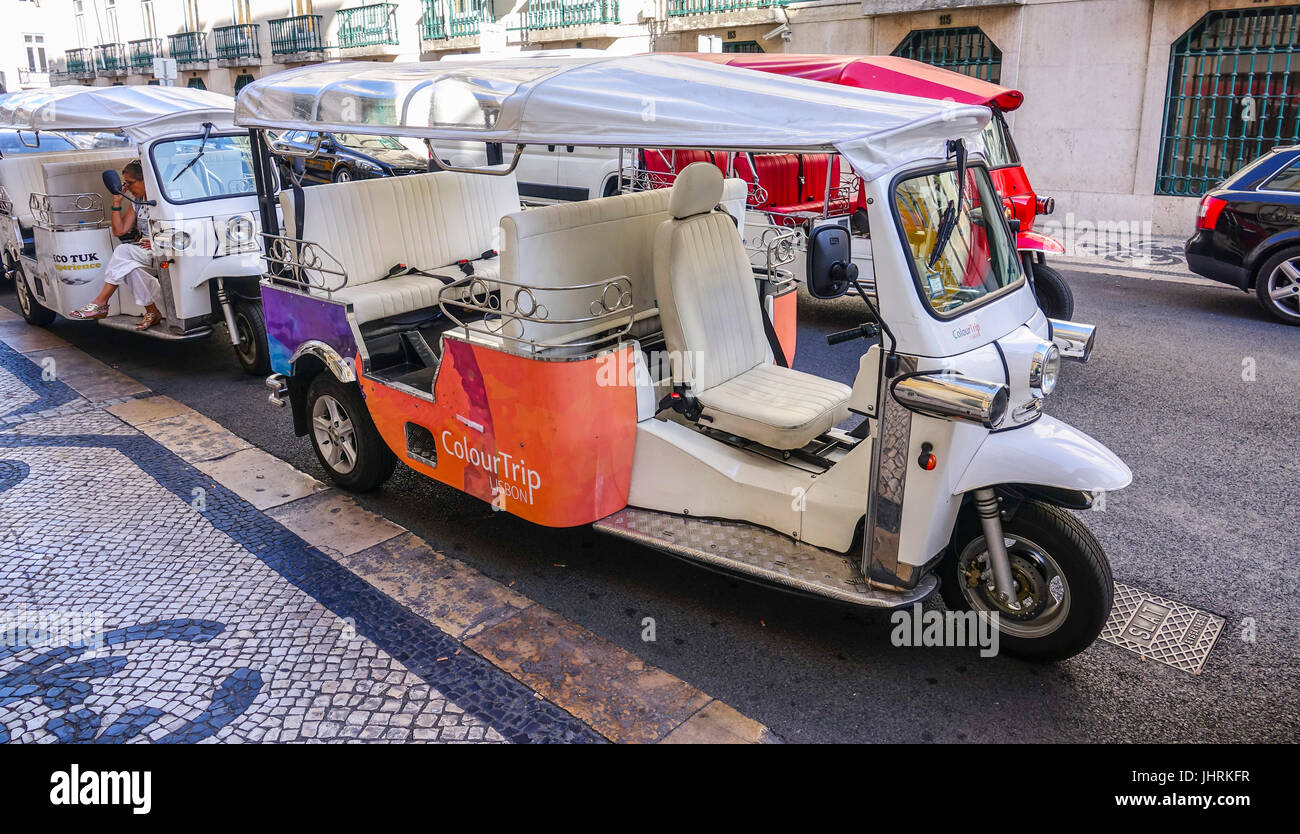 Famous Tuk Tuk Cars in the city of Lisbon - LISBON, PORTUGAL 2017 Stock Photo