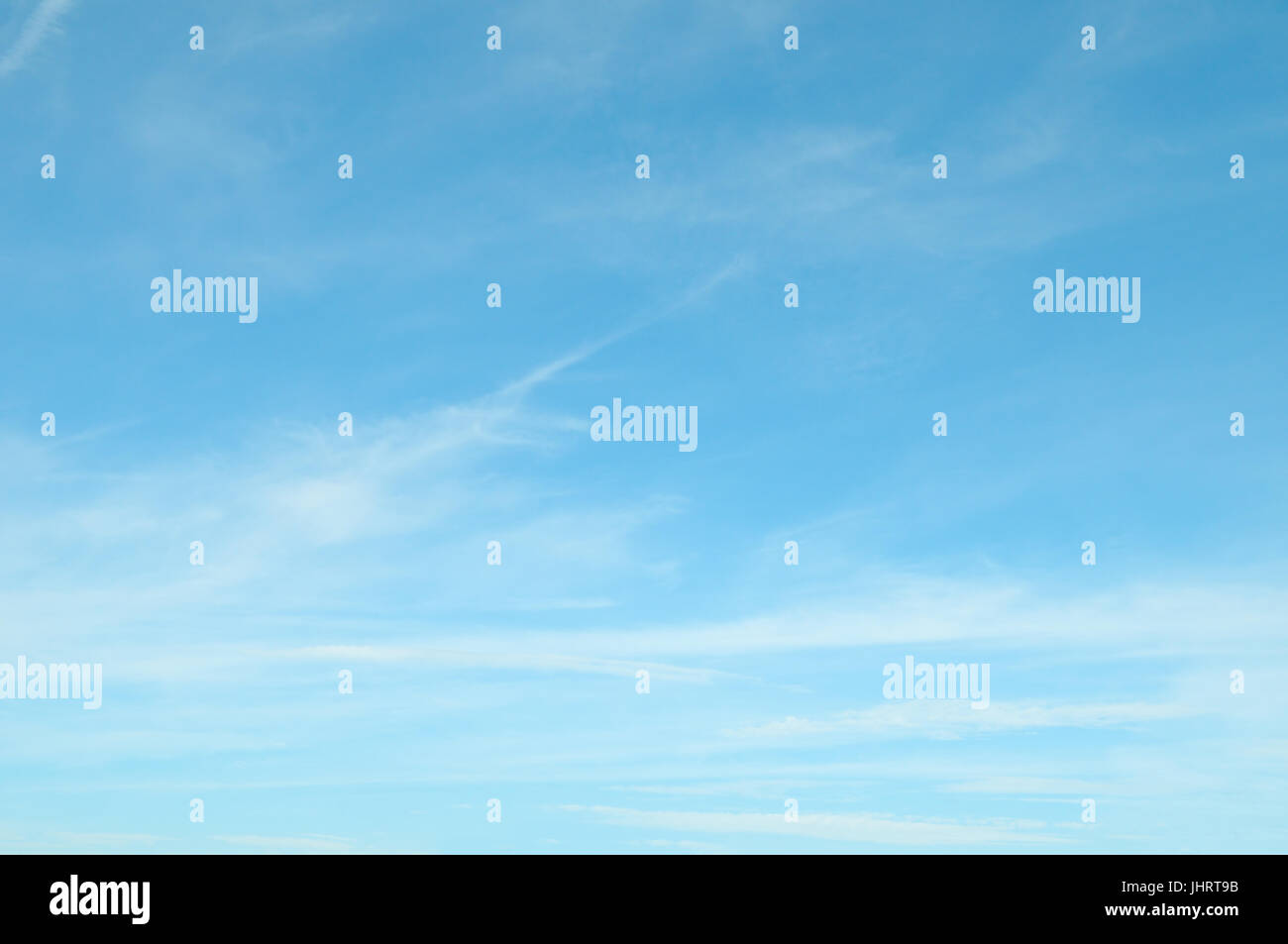 fluffy clouds in the blue sky Stock Photo - Alamy