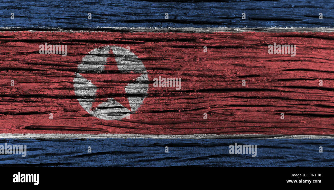 North korea flag with high detail of old wooden background . 3D illustration . Stock Photo