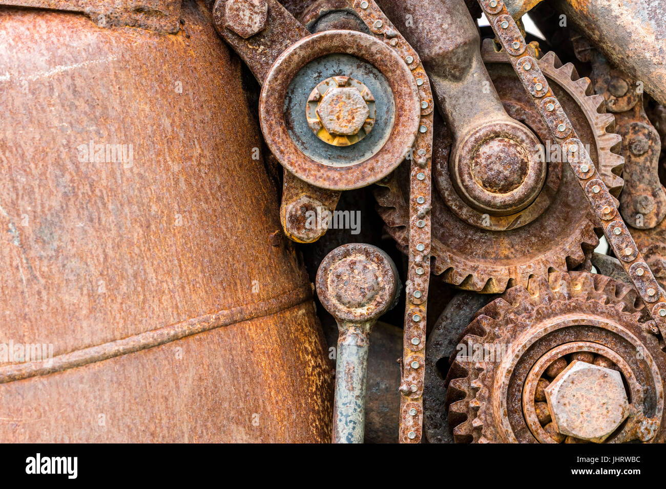 grunge corroded metal components of industrial machine closeup Stock