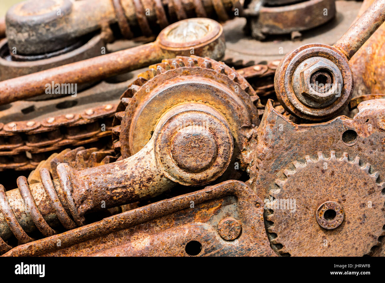 old corroded mechanical gear cogwheels and sprockets closeup Stock