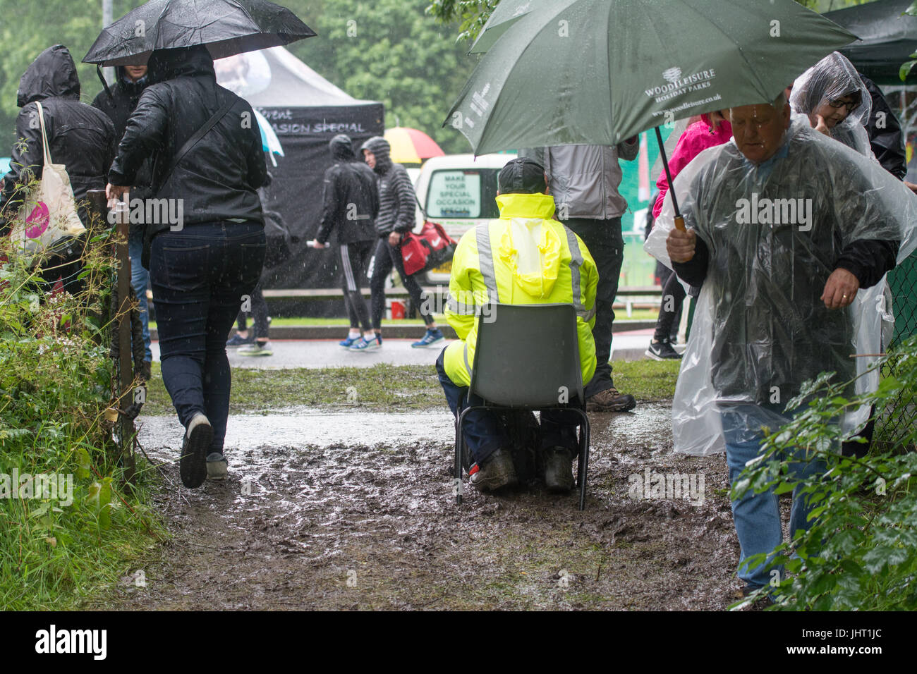 Balloch, Loch Lomond, Scotland, UK. 15th July, 2017. UK weather - heavy and persistant rain at the Loch Lomond Highland Games, which incorporate the Scottish Highland Games Association Official World Heavyweight Championship as well as local events Credit: Kay Roxby/Alamy Live News Stock Photo