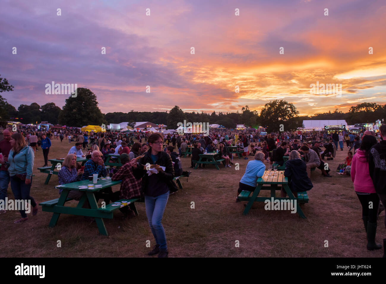 Latitude Festival, UK. 15th July, 2017. The sun sets on Saturday evening - The 2017 Latitude Festival, Henham Park. Suffolk 15 July 2017 Credit: Guy Bell/Alamy Live News Stock Photo