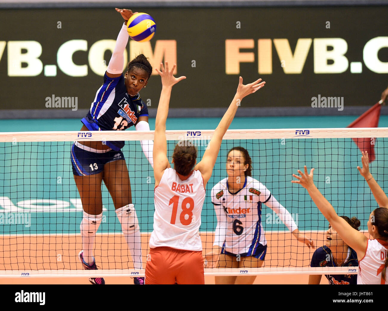 Macao, China. 16th July, 2017. Miryam Fatime Sylla (L) spikes the ball during the Pool E1-Group 1 match of the FIVB World Grand Prix 2017 against Turkey in Macao, China, July 16, 2017. Credit: Lo Ping Fai/Xinhua/Alamy Live News Stock Photo